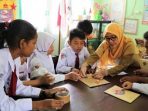 Guru peran penting