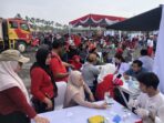 IMG_6041 Banyak peserta memanfaatkan layanan pos pelayanan pemeriksaan kesehatan gratis Jiddan-Jihaan, S.Ked – Ralvin S.Ked. untuk memeriksakan kesehatannya